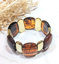 Bracelet élastique brun et doré